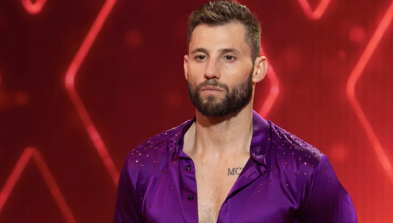 A dancer in a purple costume on DWTS: The Next Pro.