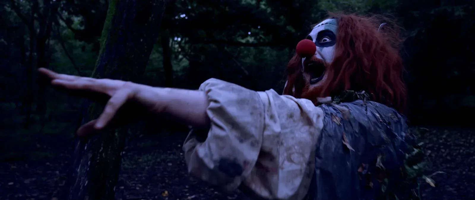 Why Does Charlie Wear a Clown Costume and Perform Magic Tricks in The Forest Clown?