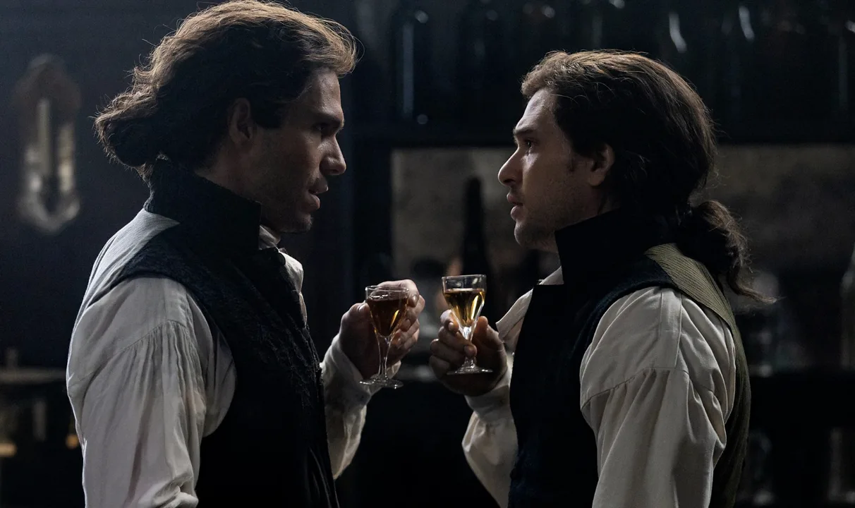 Why Do Sydney Carton and Charles Darnay Look Alike in A Tale of Two Cities? Are They Related?