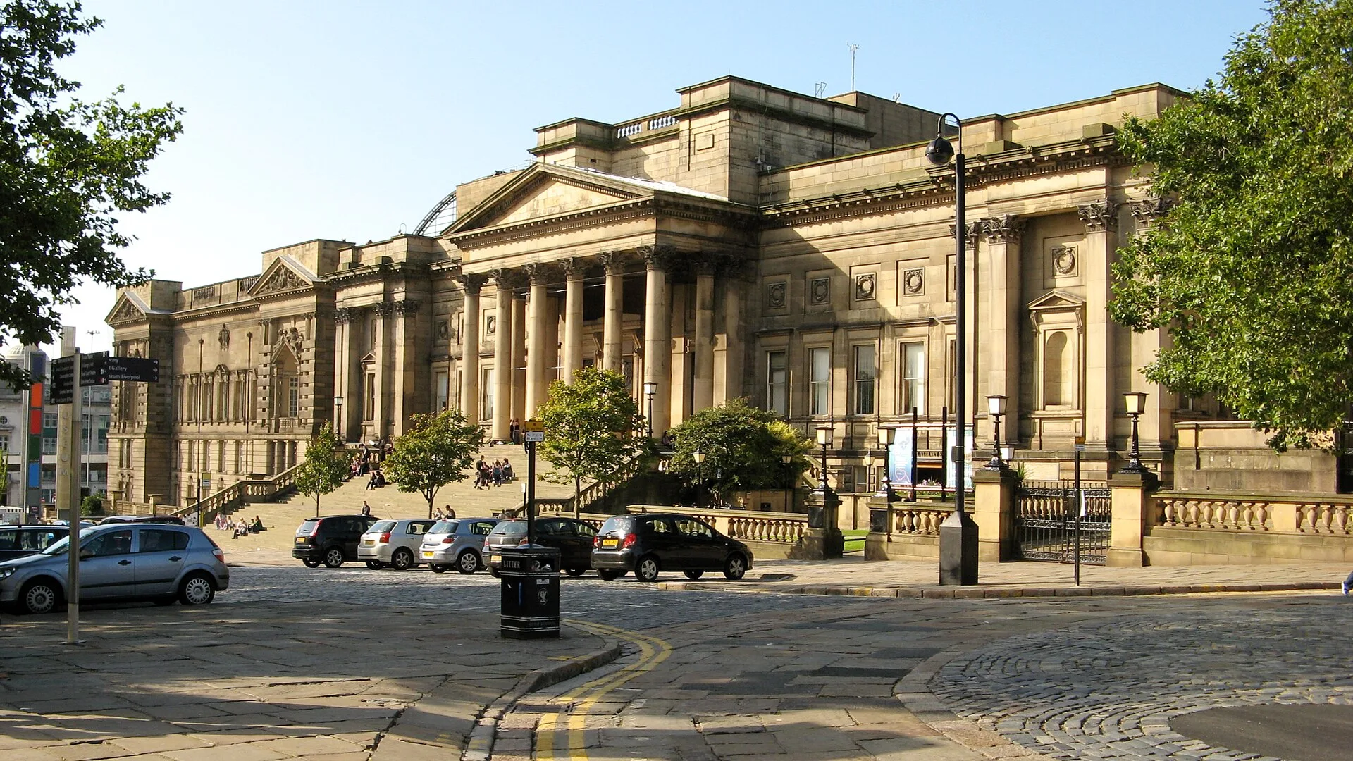 World Museum exterior with stone columns and broad entrance steps.