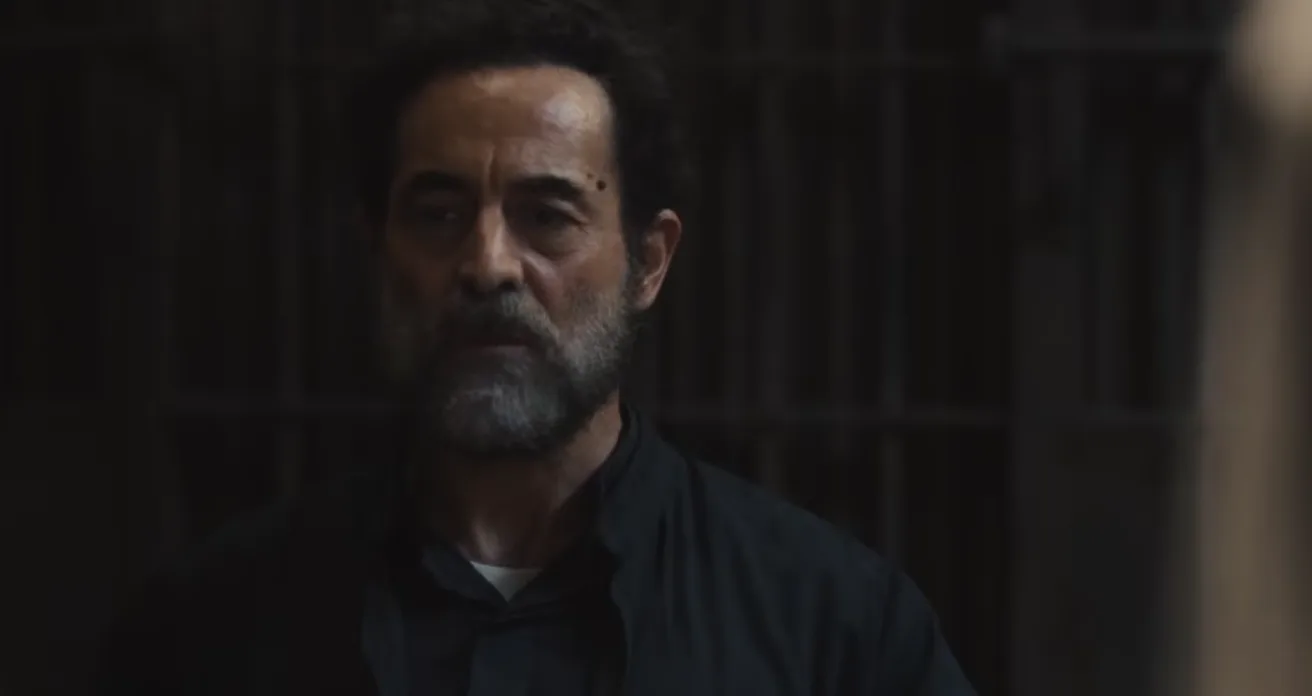 Waleed Zuaiter as Saddam Hussein